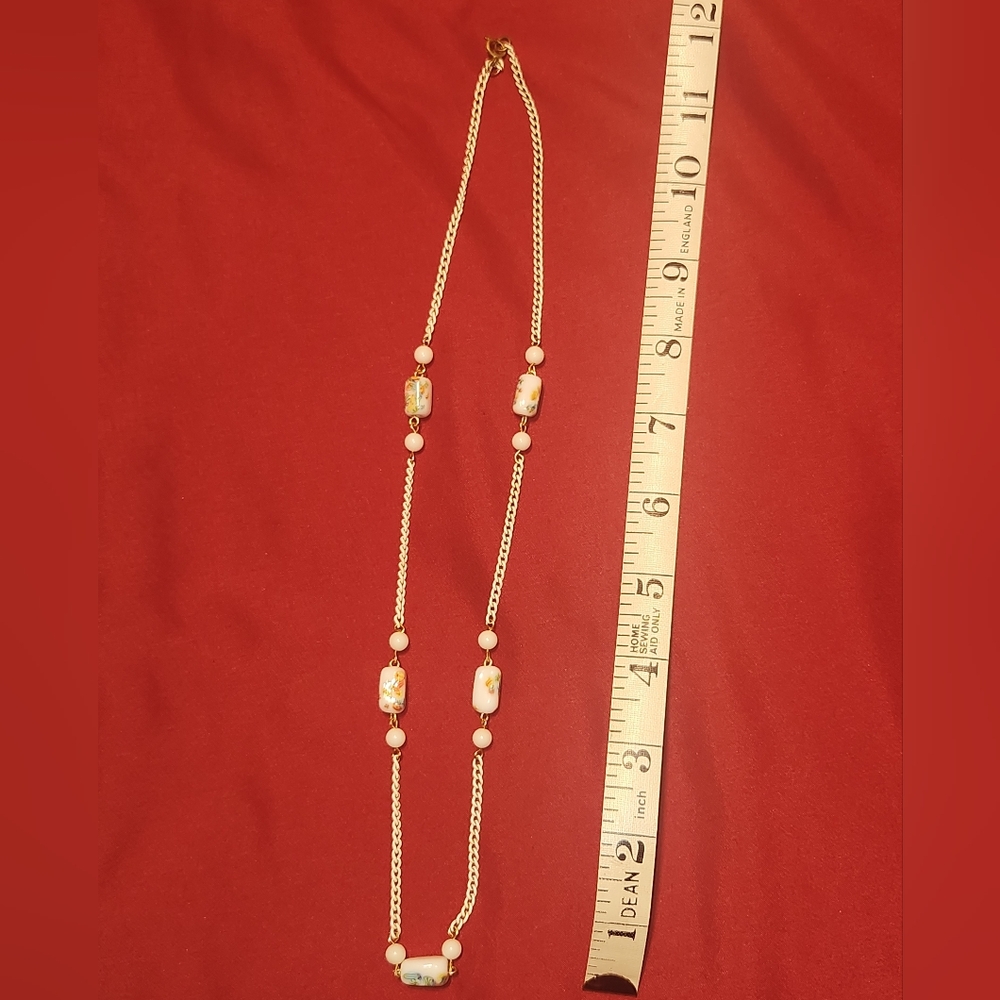 Elegant Gold and Pink Beaded Necklace